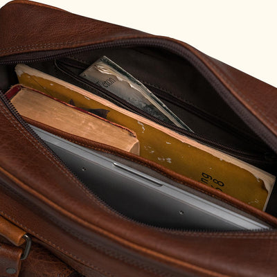 Interior - Separate Laptop Sleeve and areas for organization, zippered, and thick durable canvas