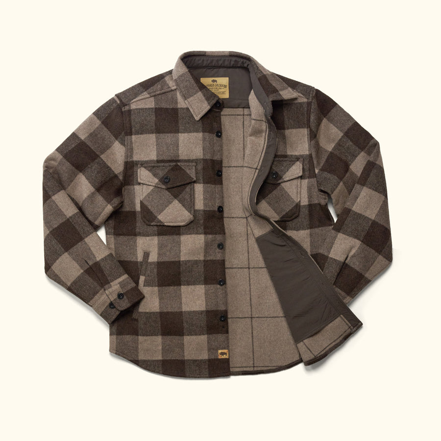 Styled outdoor shot of Yukon Wool Shirt Jac Buffalo Check worn over tee for layering warmth in rustic setting